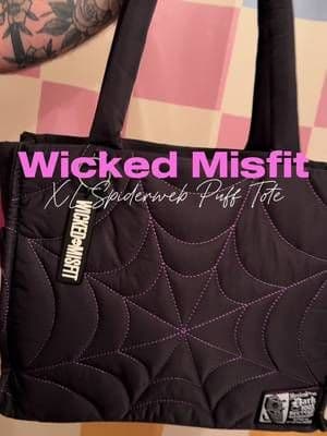 Where are all my spooky girls at?! I think I just found your new everyday bag. 🕸️🕷️ This oversized spiderweb puffer tote is giving spooky season all year long. It's lightweight, roomy enough for my laptop, planner, water bottle, and everything I need for the day, plus it has multiple pockets to keep everything organized. My favorite part? It comes in black, white, purple, and green, so you can match whatever spooky vibe you're going for. Whether you're headed to work, school, traveling, or just running errands, this tote is equal parts functional and hauntingly cute. @Wicked Misfit Shop #wickedmisfitshop #totebag #tiktokshopsummersale #tiktokshopcreatorpicks #TikTokShopFinds