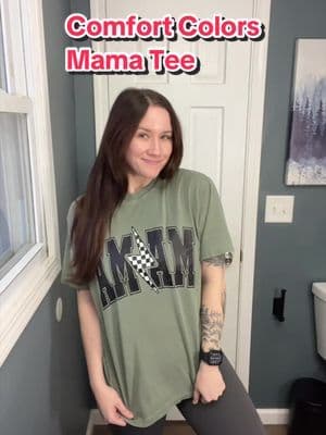 This tee though >> Obsessed. So comfy and loving the checkered lightning bolt. Perfect for running errands or just bed rotting if I’m honest 😂 #mamatee #momfashion #mamashirt #comfortcolors #tiktokshopfind
